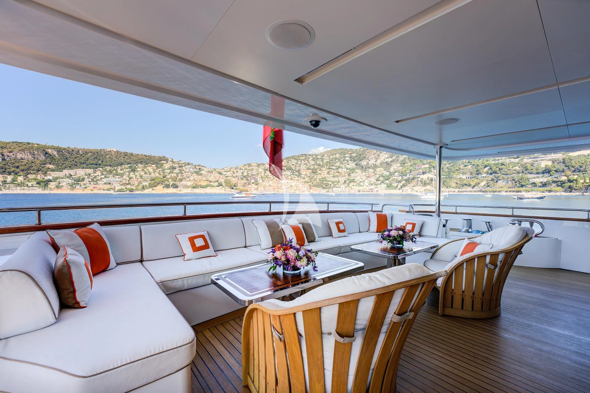 a room with a couch and a table and chairs aboard NELA Yacht for Charter