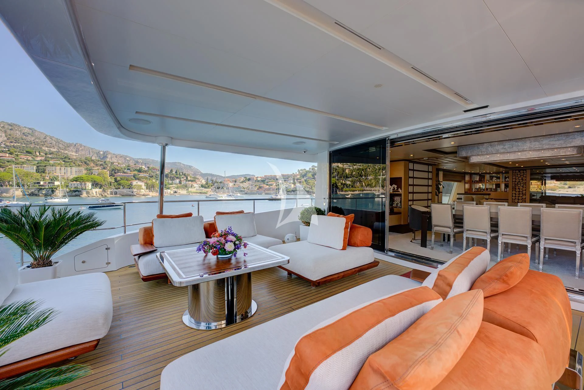 a living room with a large window aboard NELA Yacht for Charter