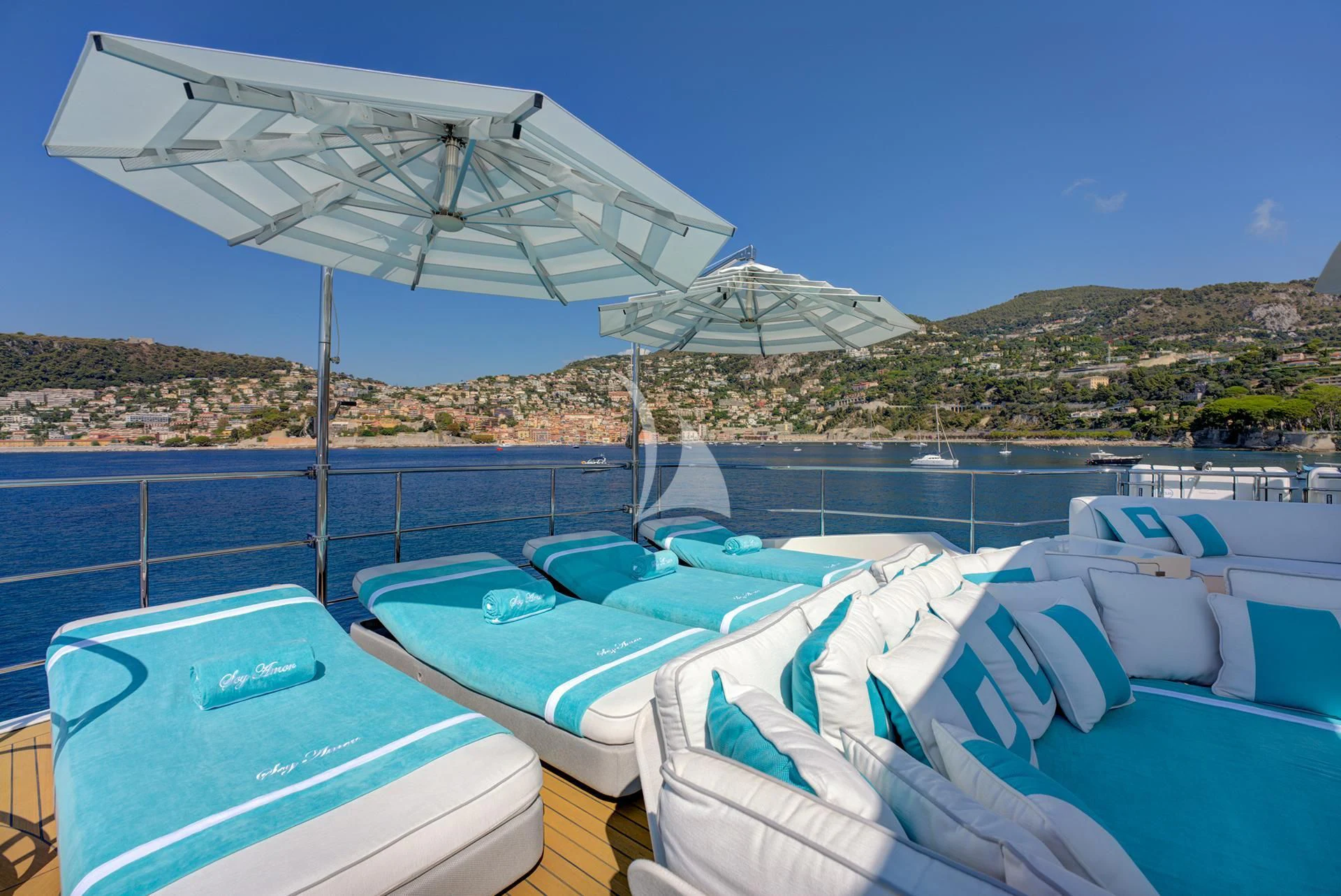 a group of boats on a body of water aboard NELA Yacht for Charter