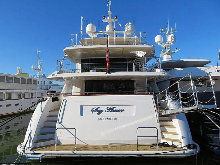 a boat docked at a pier aboard NELA Yacht for Charter