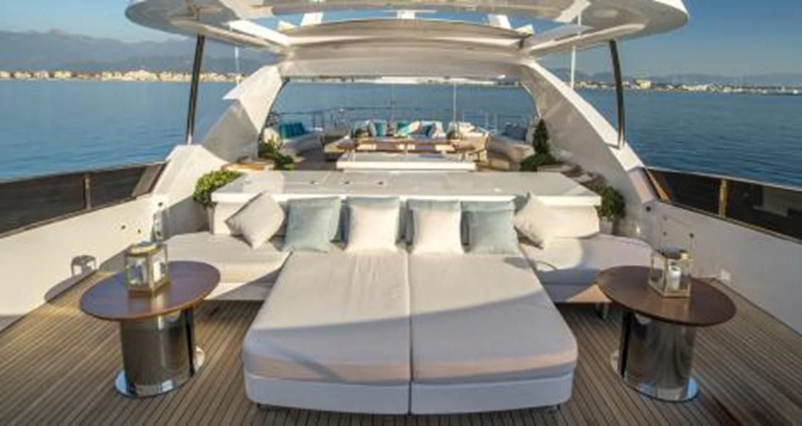 a room with a table and chairs aboard NELA Yacht for Charter