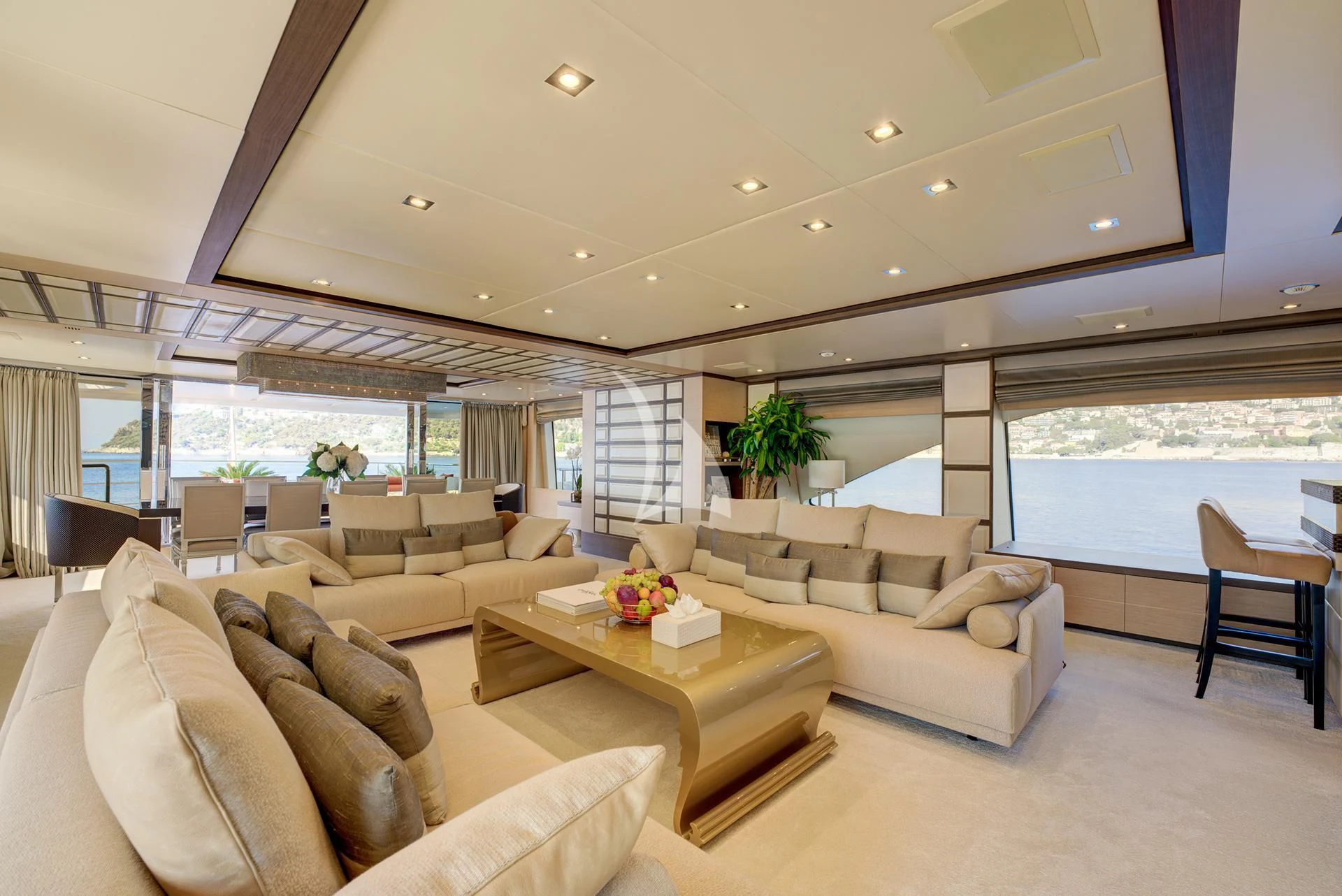 a living room with a large window aboard NELA Yacht for Charter