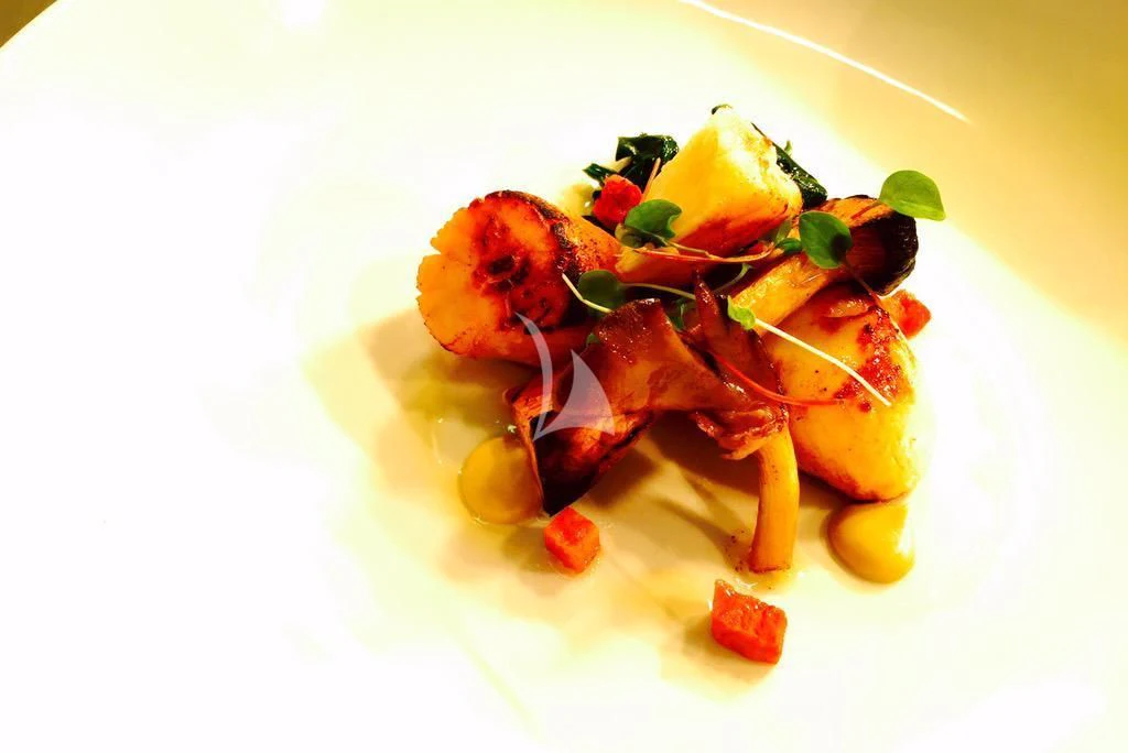 a plate of food aboard NELA Yacht for Charter