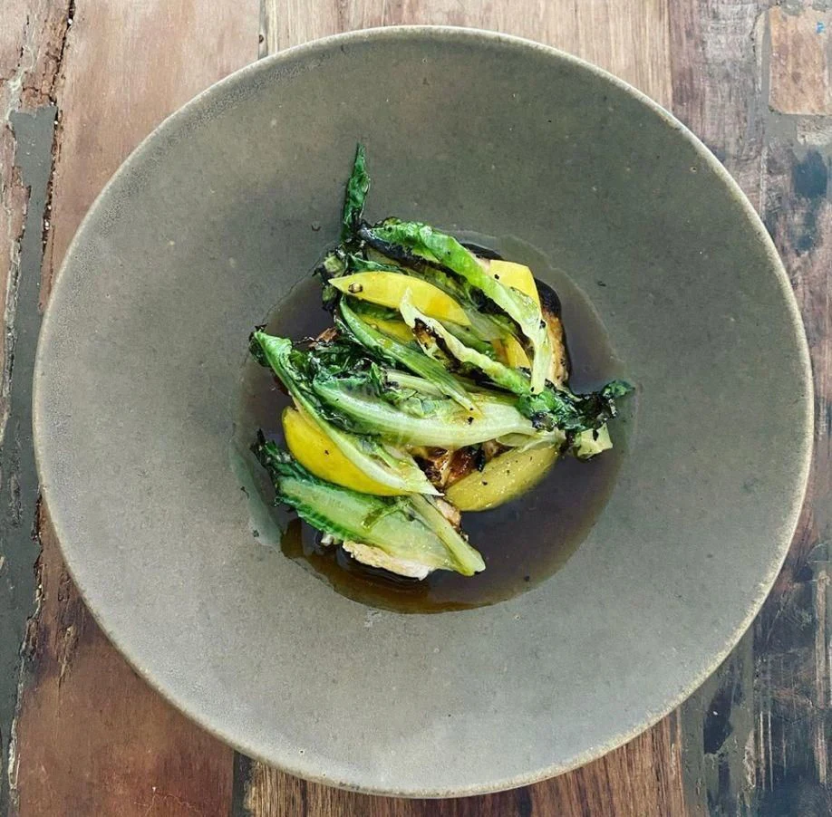 a plate of food aboard NELA Yacht for Charter