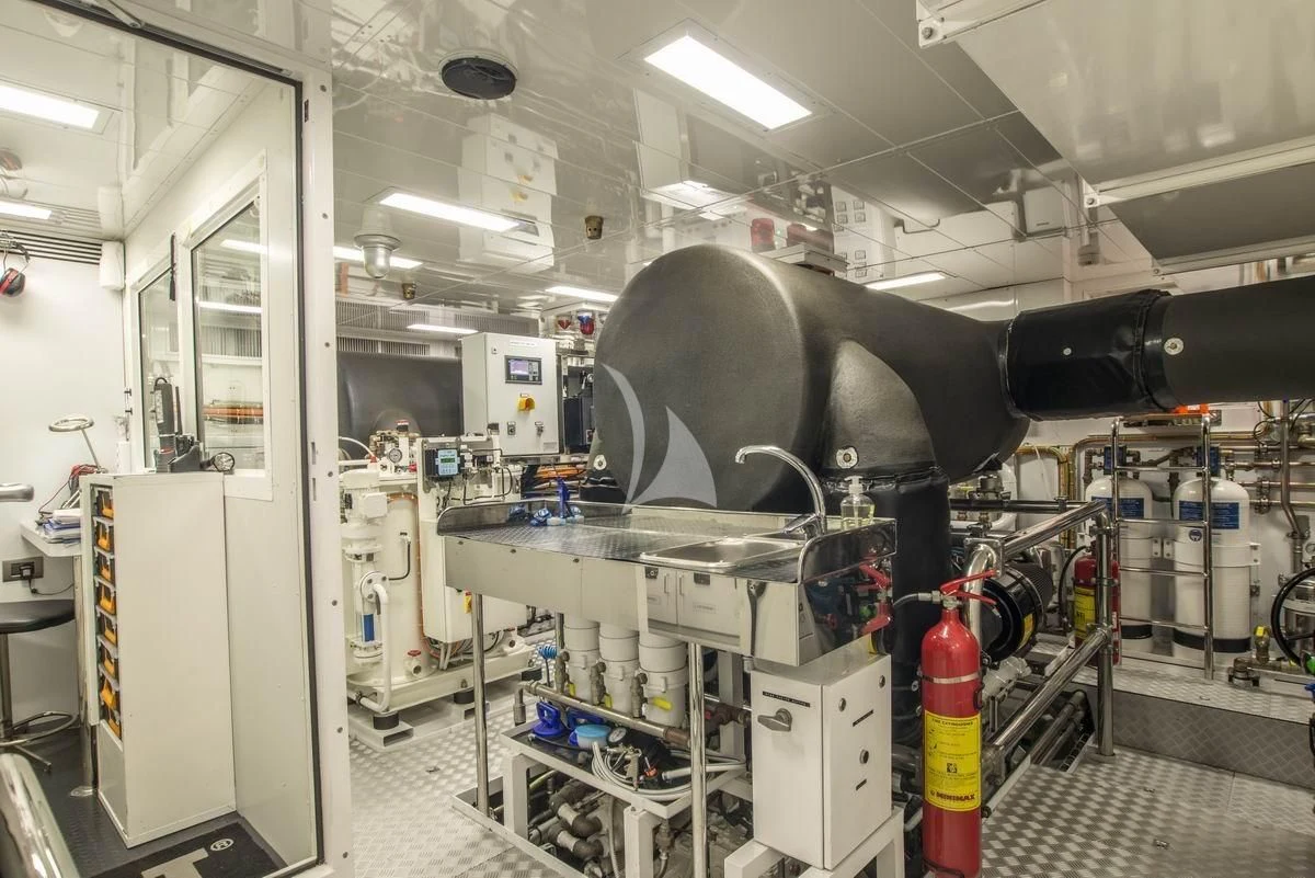 a large machine in a factory aboard NELA Yacht for Charter