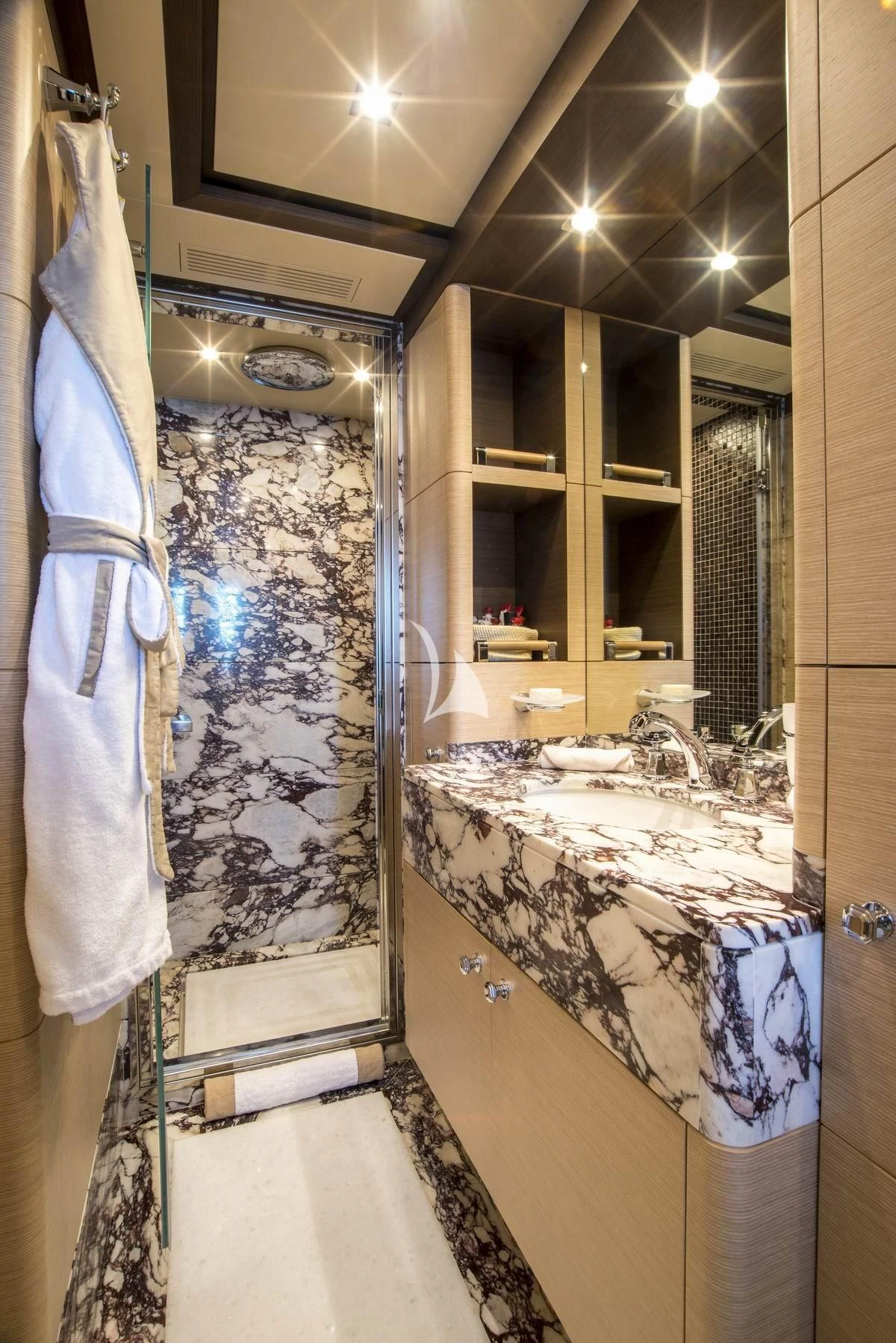 a bathroom with a marble counter top aboard NELA Yacht for Charter