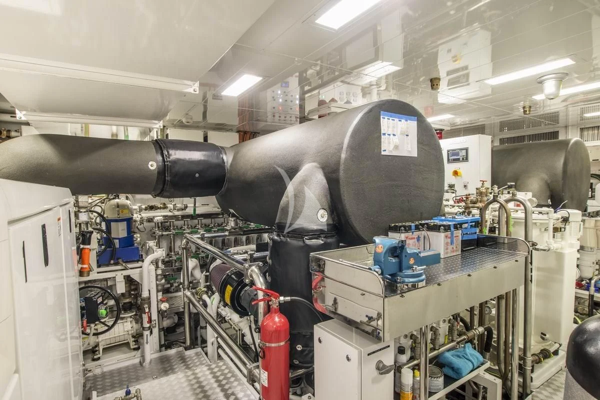 a large industrial machine aboard NELA Yacht for Charter