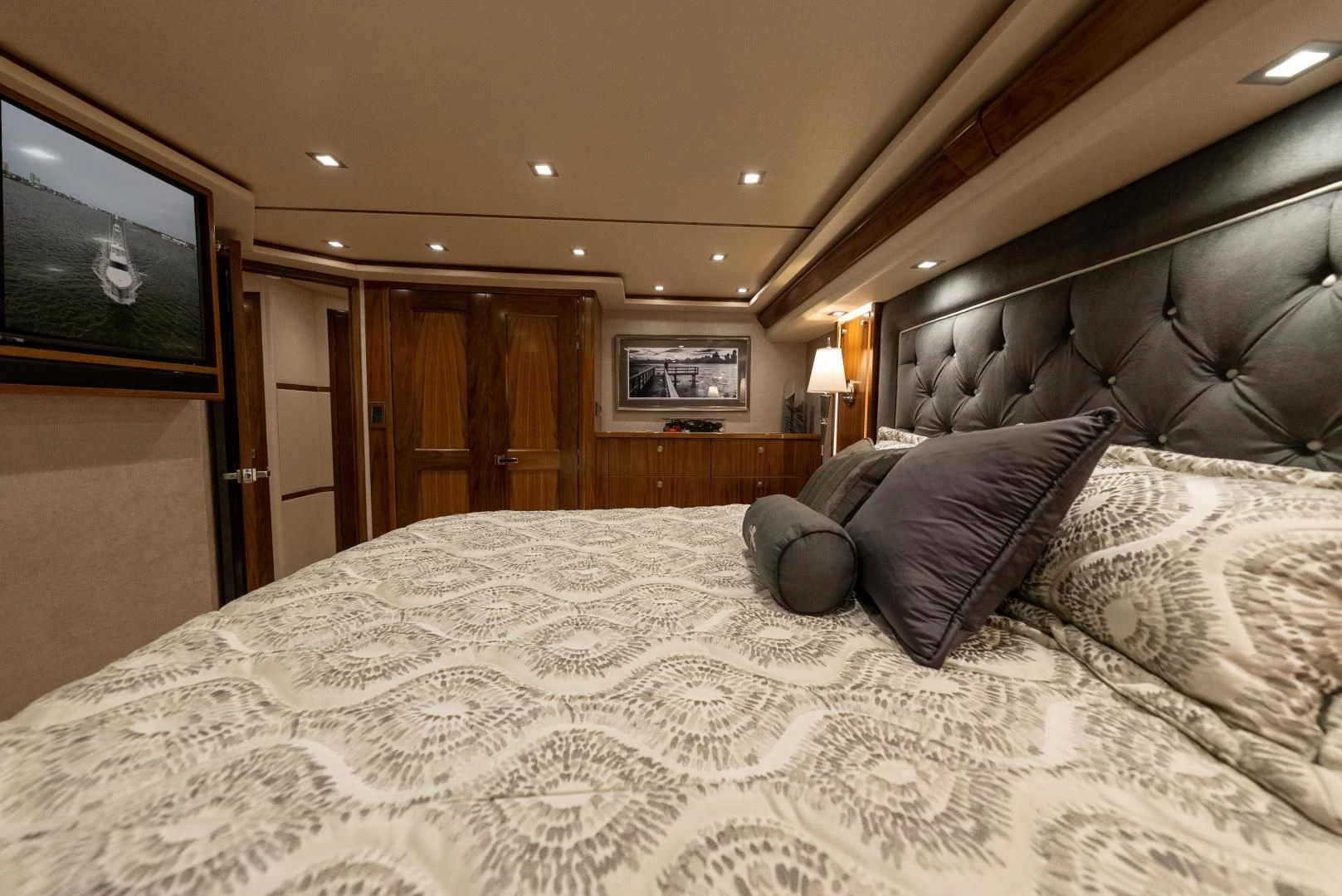 a bed with pillows on it aboard IT JUST TAKES TIME Yacht for Sale