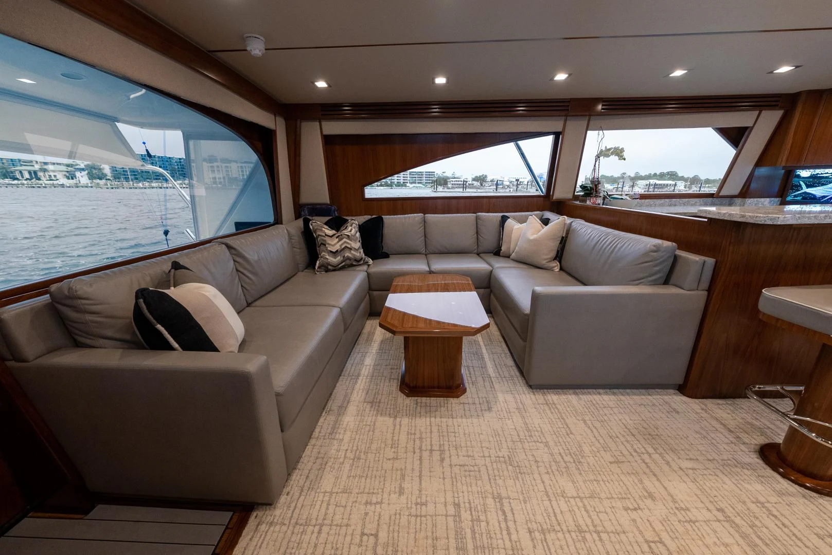 a living room with a couch and a coffee table aboard IT JUST TAKES TIME Yacht for Sale