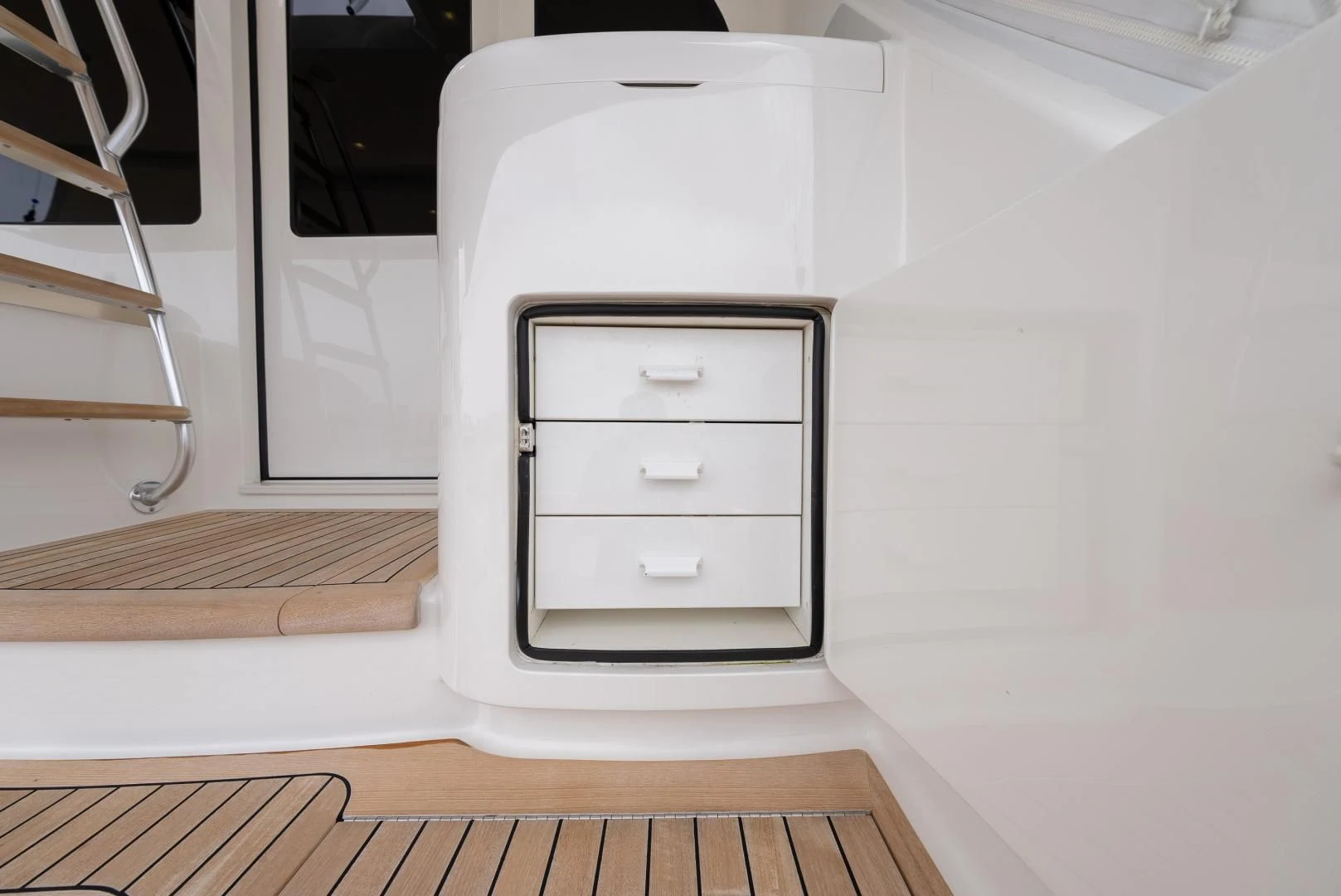 a white cabinet with drawers aboard IT JUST TAKES TIME Yacht for Sale
