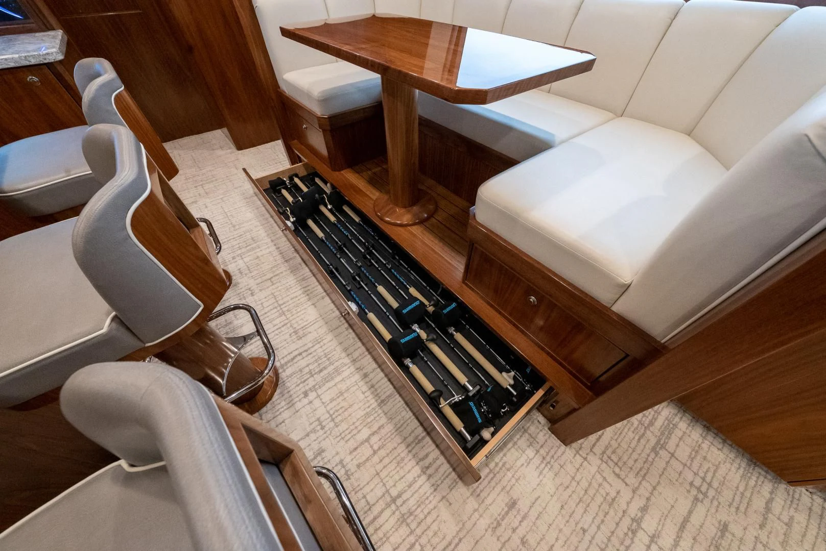 a coffee table and chairs aboard IT JUST TAKES TIME Yacht for Sale