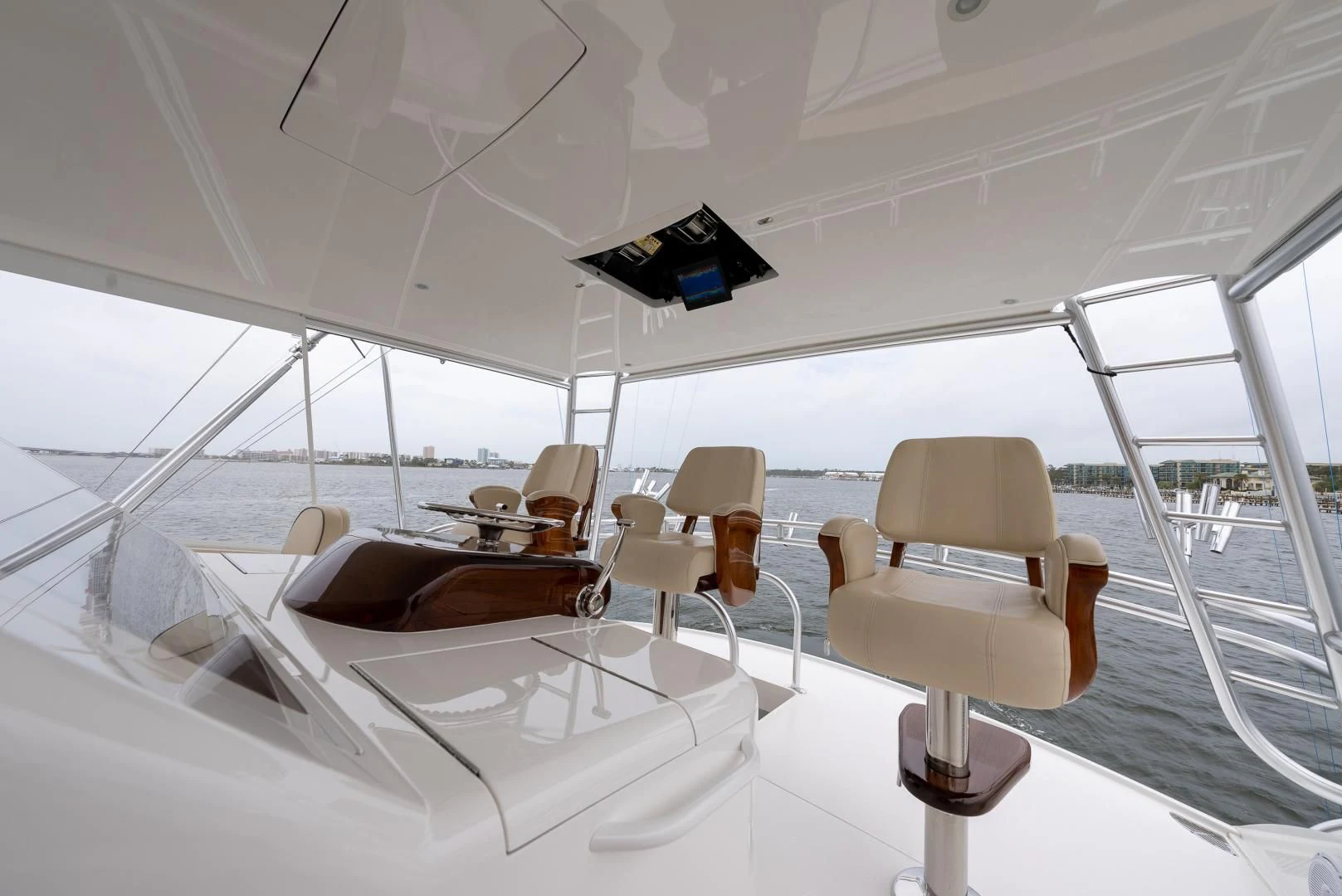 a room with a bed and chairs aboard IT JUST TAKES TIME Yacht for Sale
