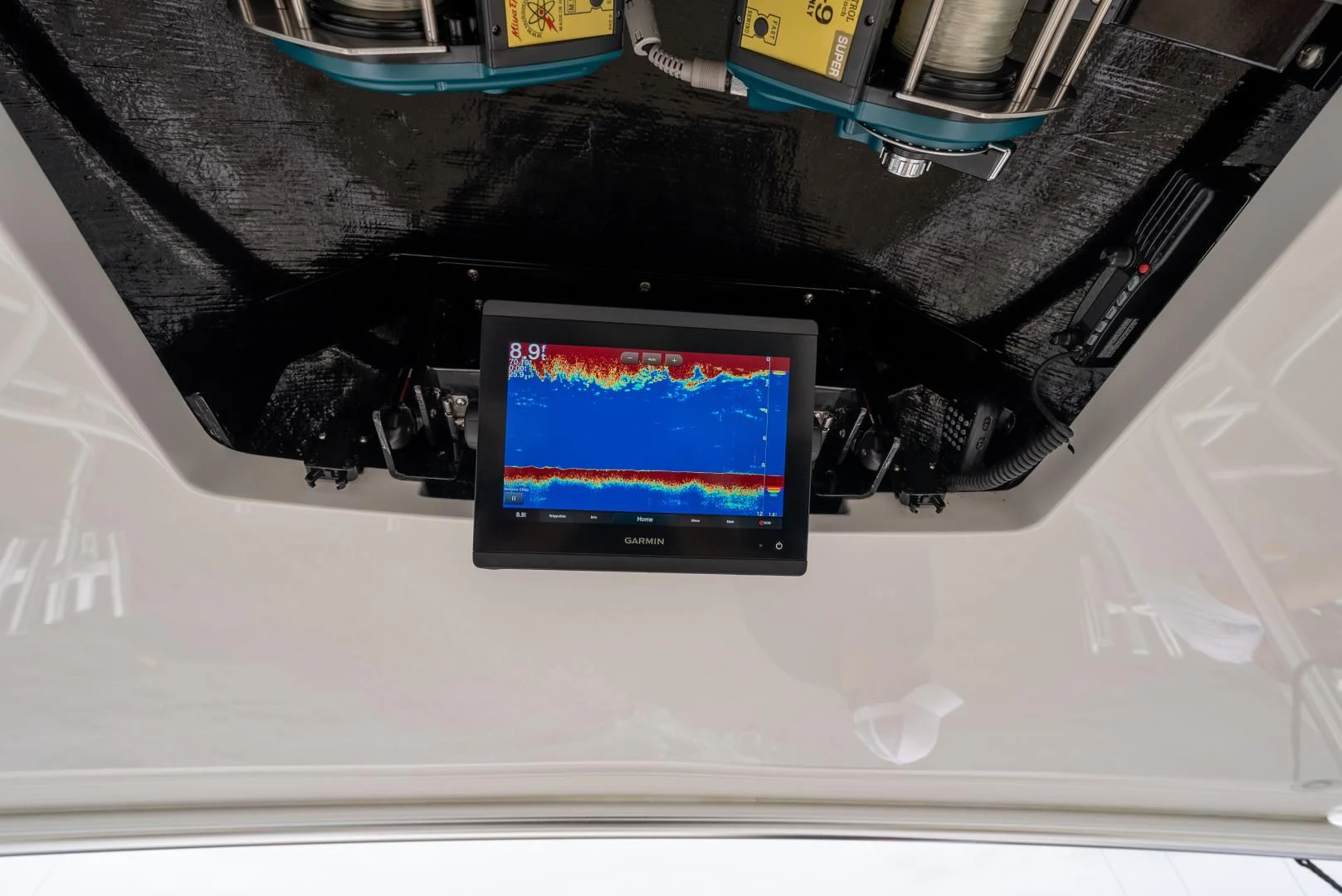 a screen on a steering wheel aboard IT JUST TAKES TIME Yacht for Sale