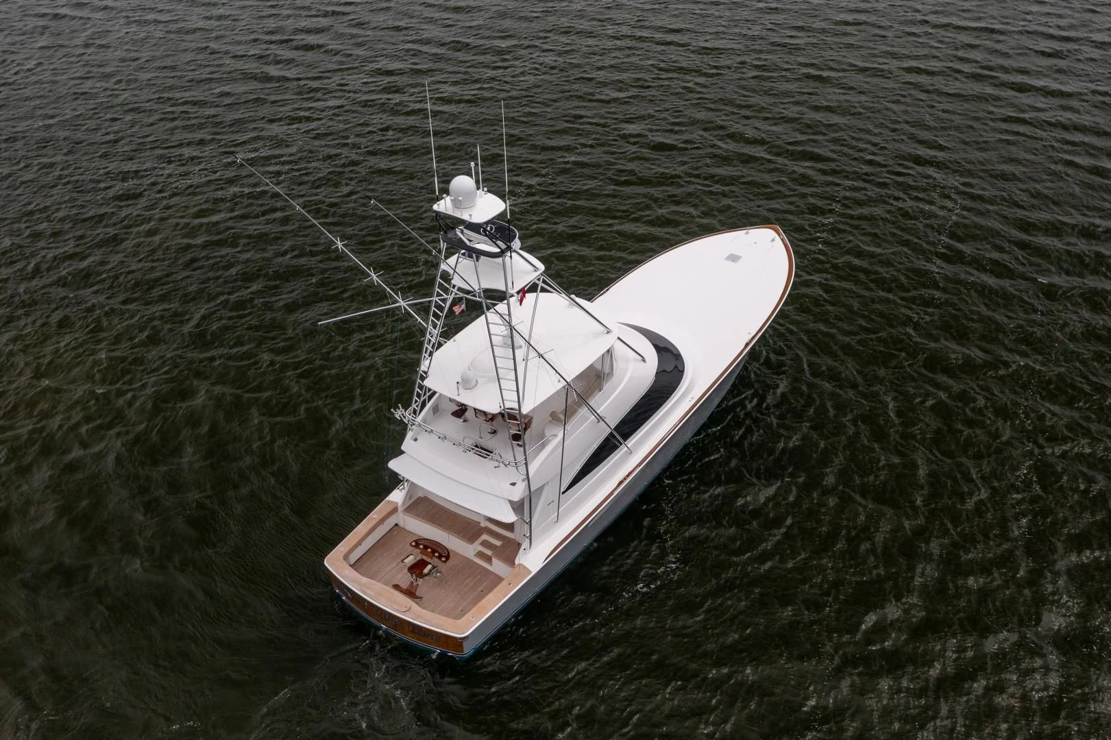 a boat in the water aboard IT JUST TAKES TIME Yacht for Sale
