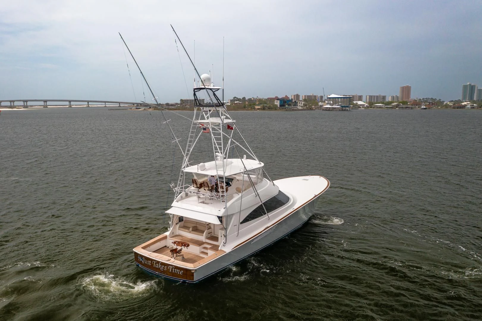 a boat in the water aboard IT JUST TAKES TIME Yacht for Sale