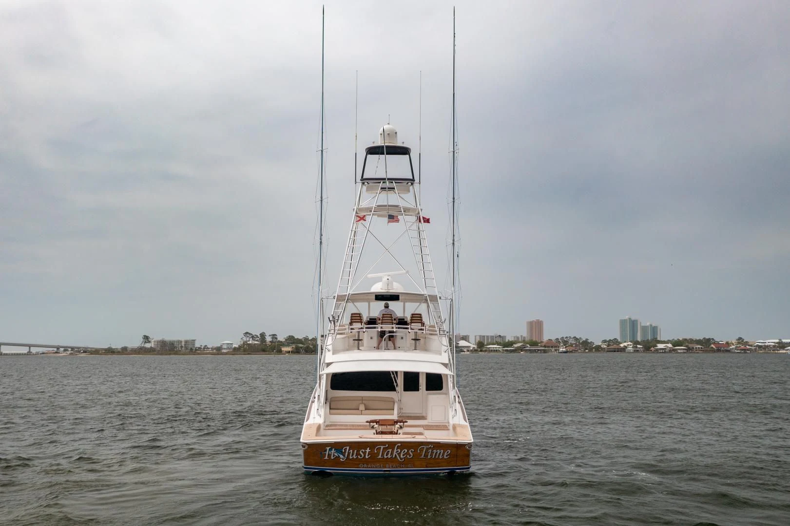 a boat in the water aboard IT JUST TAKES TIME Yacht for Sale