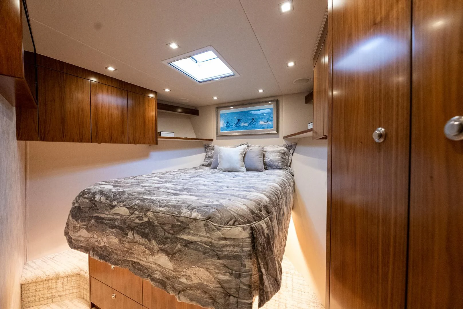 a bedroom with a bed and a wood closet aboard IT JUST TAKES TIME Yacht for Sale