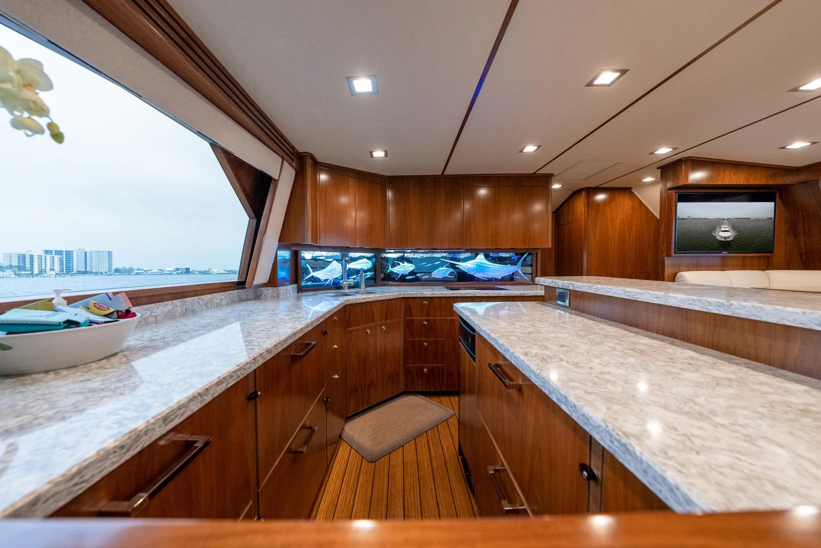 a kitchen with a large island aboard IT JUST TAKES TIME Yacht for Sale