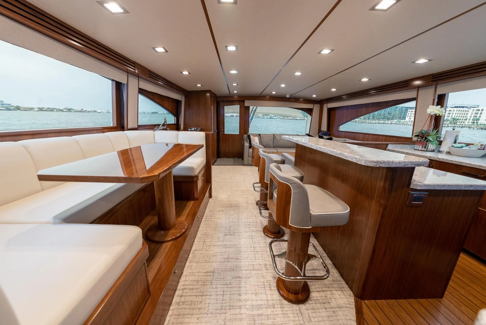 a room with tables and chairs aboard IT JUST TAKES TIME Yacht for Sale