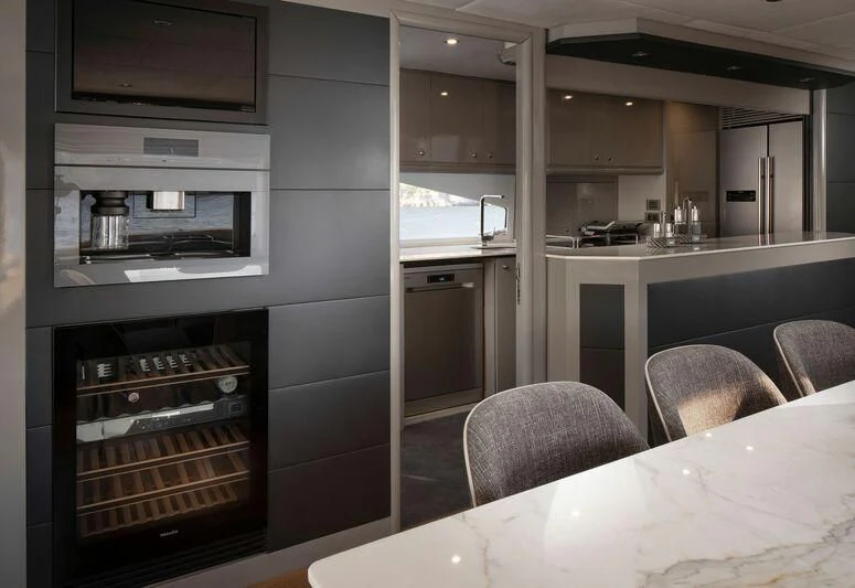a kitchen with a microwave oven aboard SPACE ODDITY Yacht for Sale