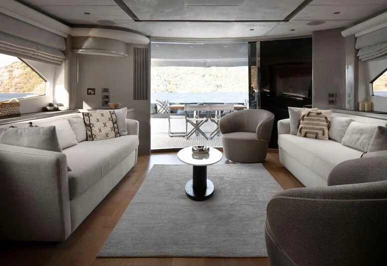 a living room with a large window aboard SPACE ODDITY Yacht for Sale