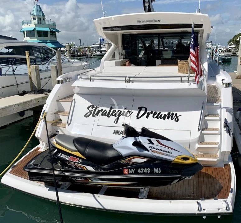 a boat on the water aboard STRATEGIC DREAMS Yacht for Sale