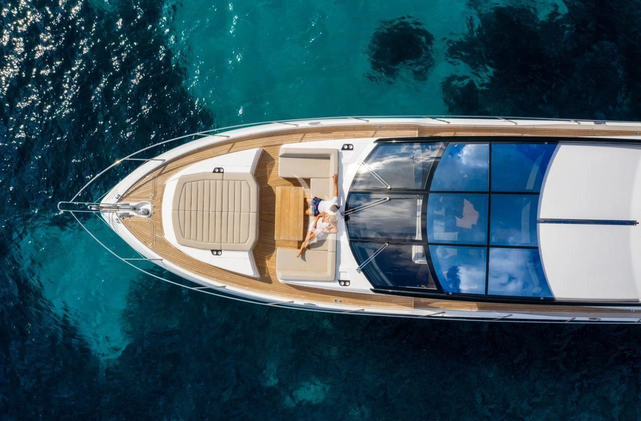 a boat with a person on it aboard STRATEGIC DREAMS Yacht for Sale