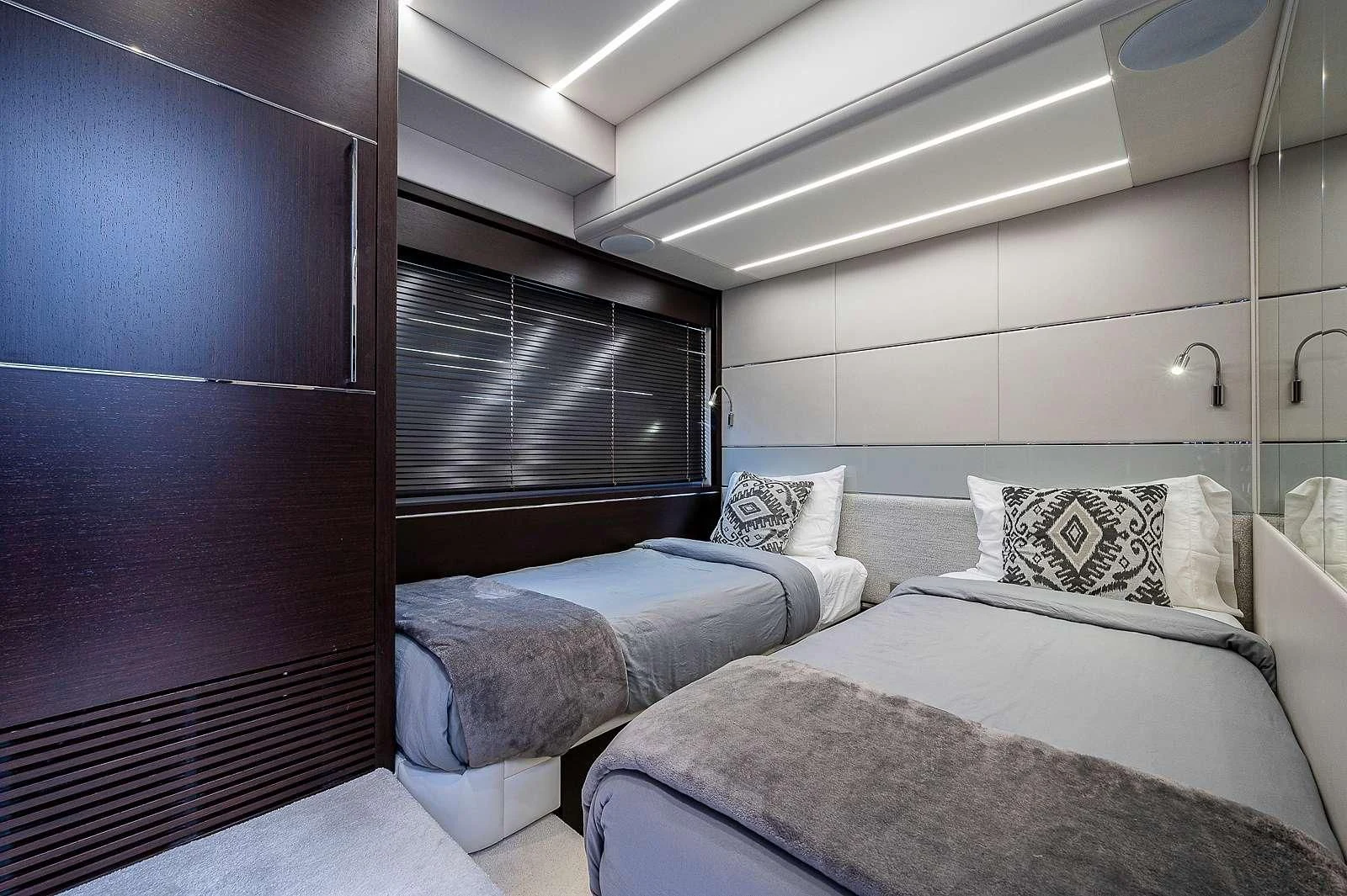 a room with two beds aboard STRATEGIC DREAMS Yacht for Sale