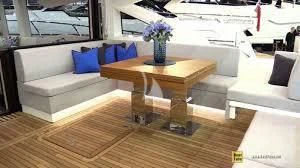 a table and couch in a room aboard STRATEGIC DREAMS Yacht for Sale