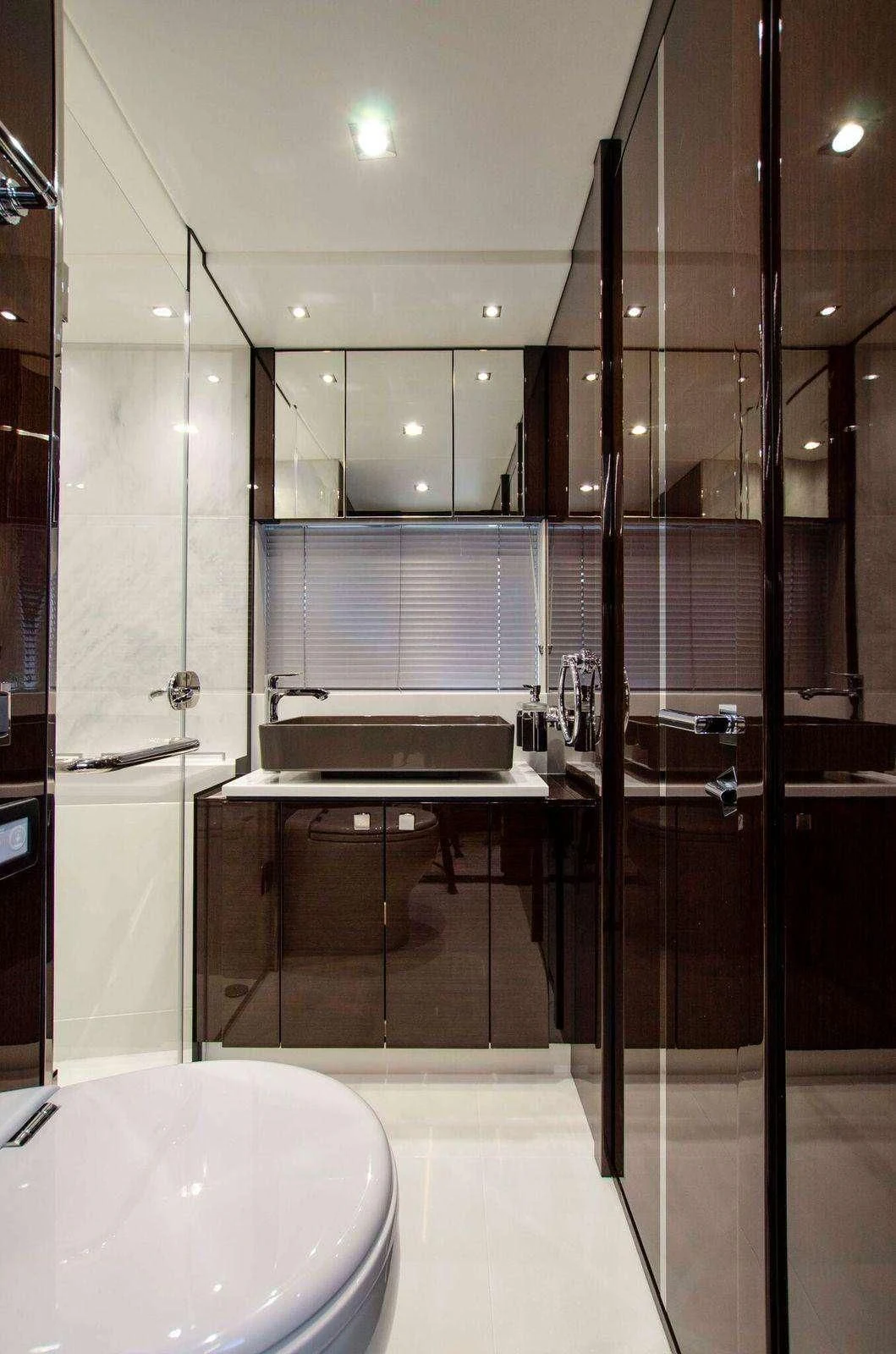 a bathroom with a sink and a toilet aboard STRATEGIC DREAMS Yacht for Sale