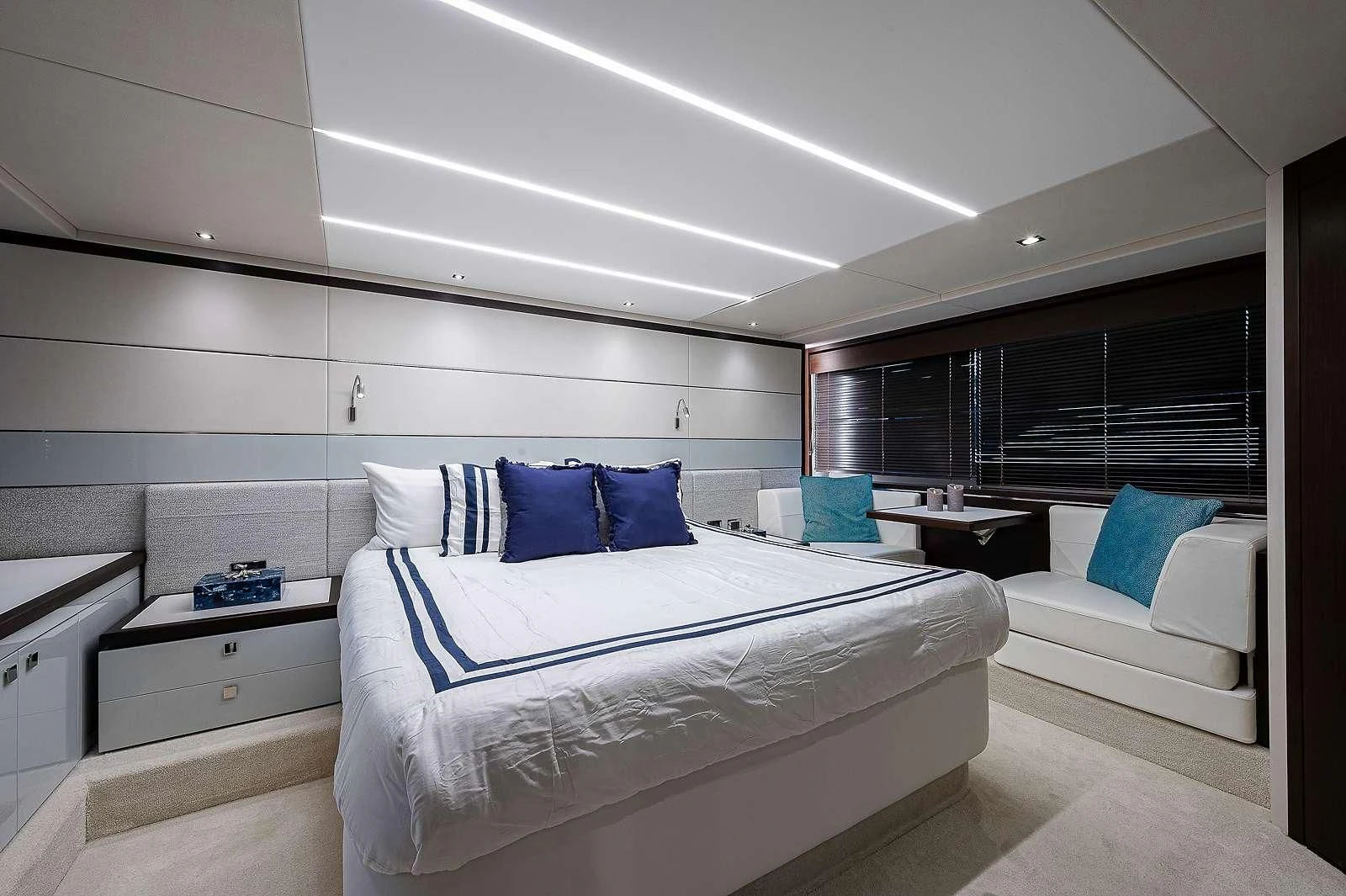 a room with a bed and a couch aboard STRATEGIC DREAMS Yacht for Sale