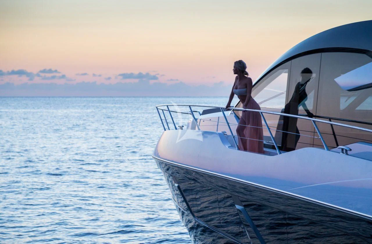 a man and woman on a boat aboard STRATEGIC DREAMS Yacht for Sale