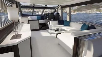 a room with a large bed and a table with chairs aboard STRATEGIC DREAMS Yacht for Sale