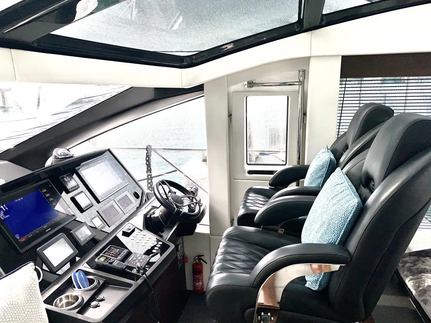 a vehicle with a couple of monitors and a couple of keyboards aboard STRATEGIC DREAMS Yacht for Sale