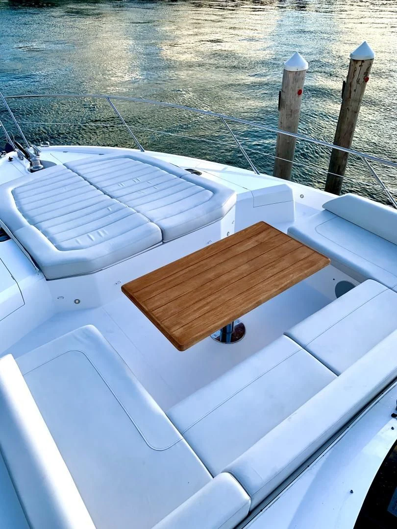 a wooden boat on a boat aboard STRATEGIC DREAMS Yacht for Sale
