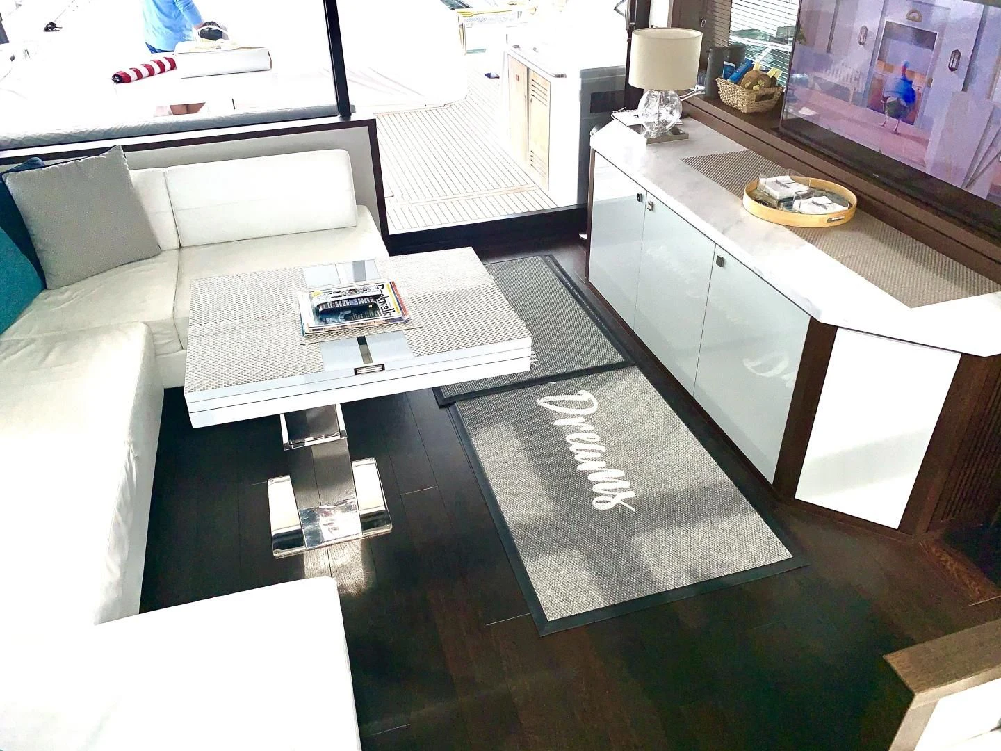 a room with a couch and a table with a computer on it aboard STRATEGIC DREAMS Yacht for Sale