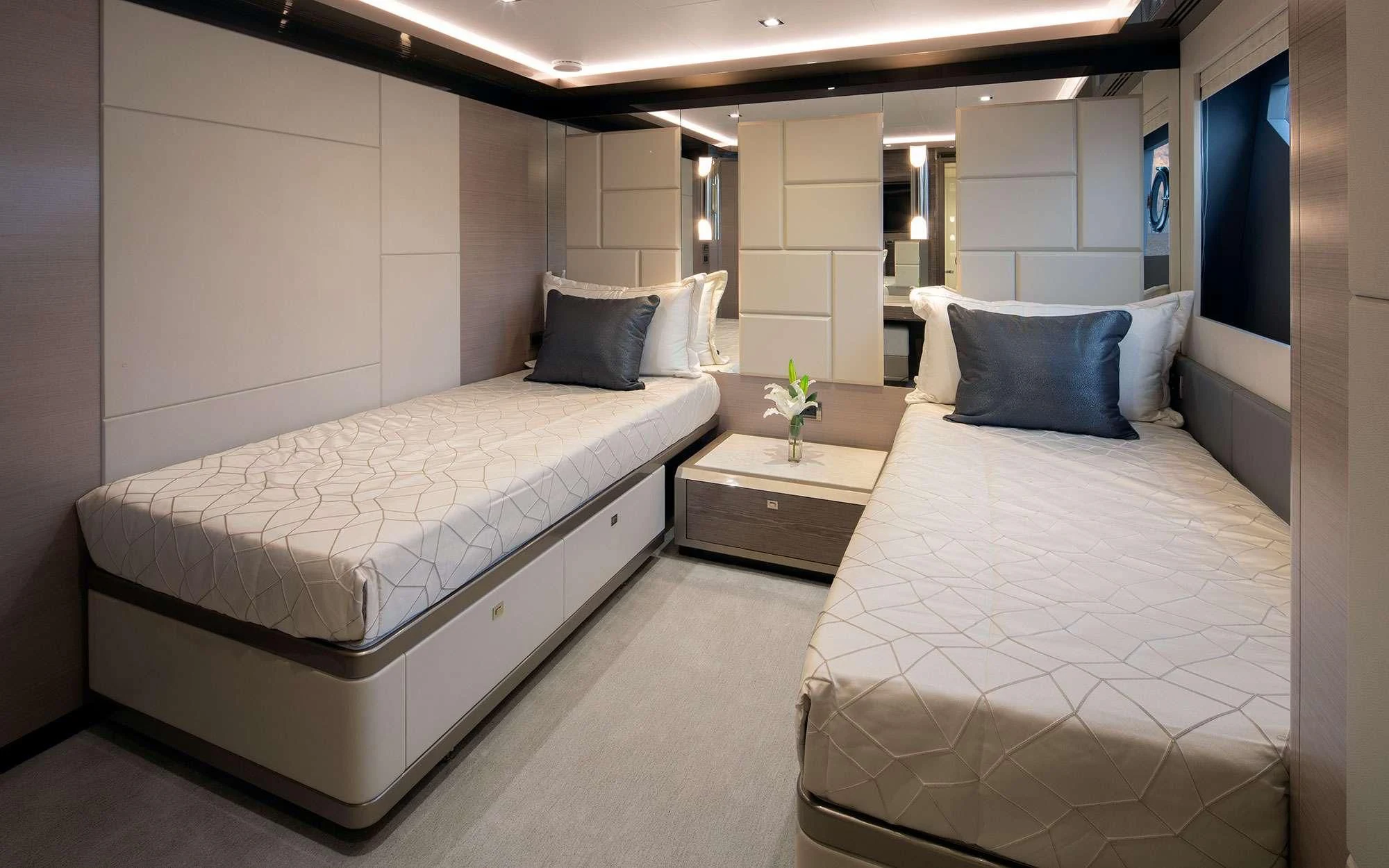 a room with two beds aboard ENTREPRENEUR Yacht for Charter