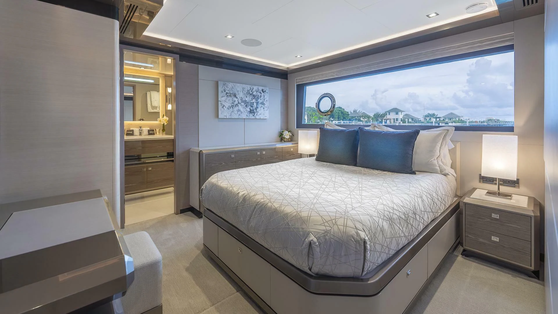 a room with a bed and a window aboard ENTREPRENEUR Yacht for Charter