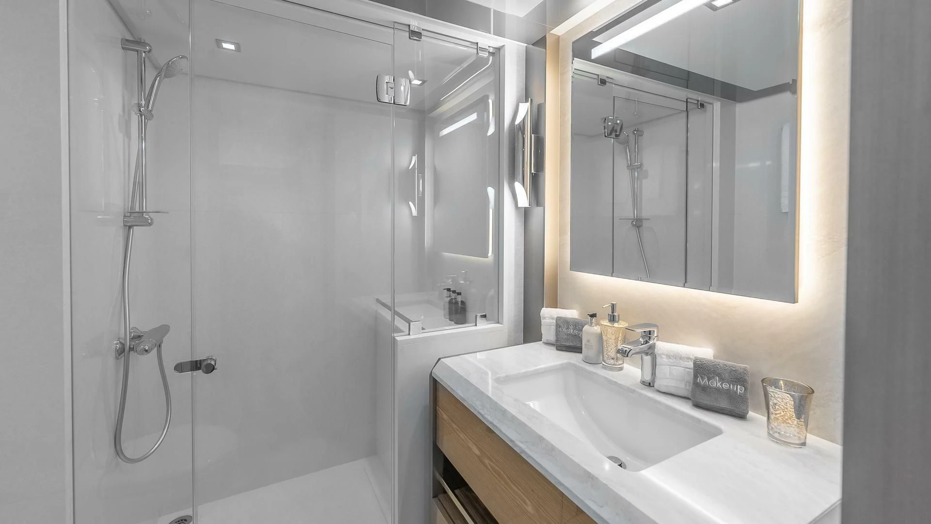 a bathroom with a shower and sink aboard ENTREPRENEUR Yacht for Charter