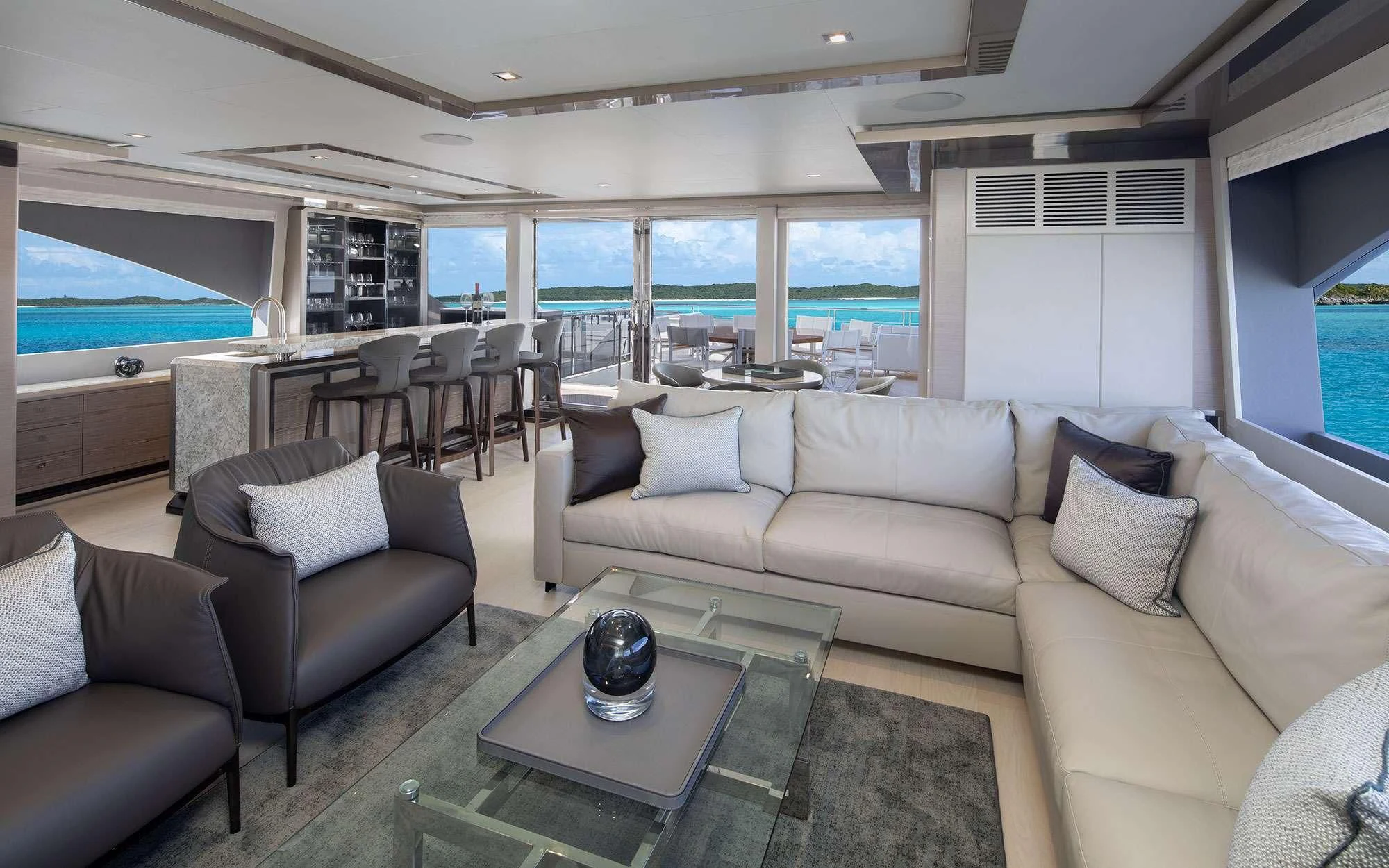 a living room with a large window aboard ENTREPRENEUR Yacht for Charter