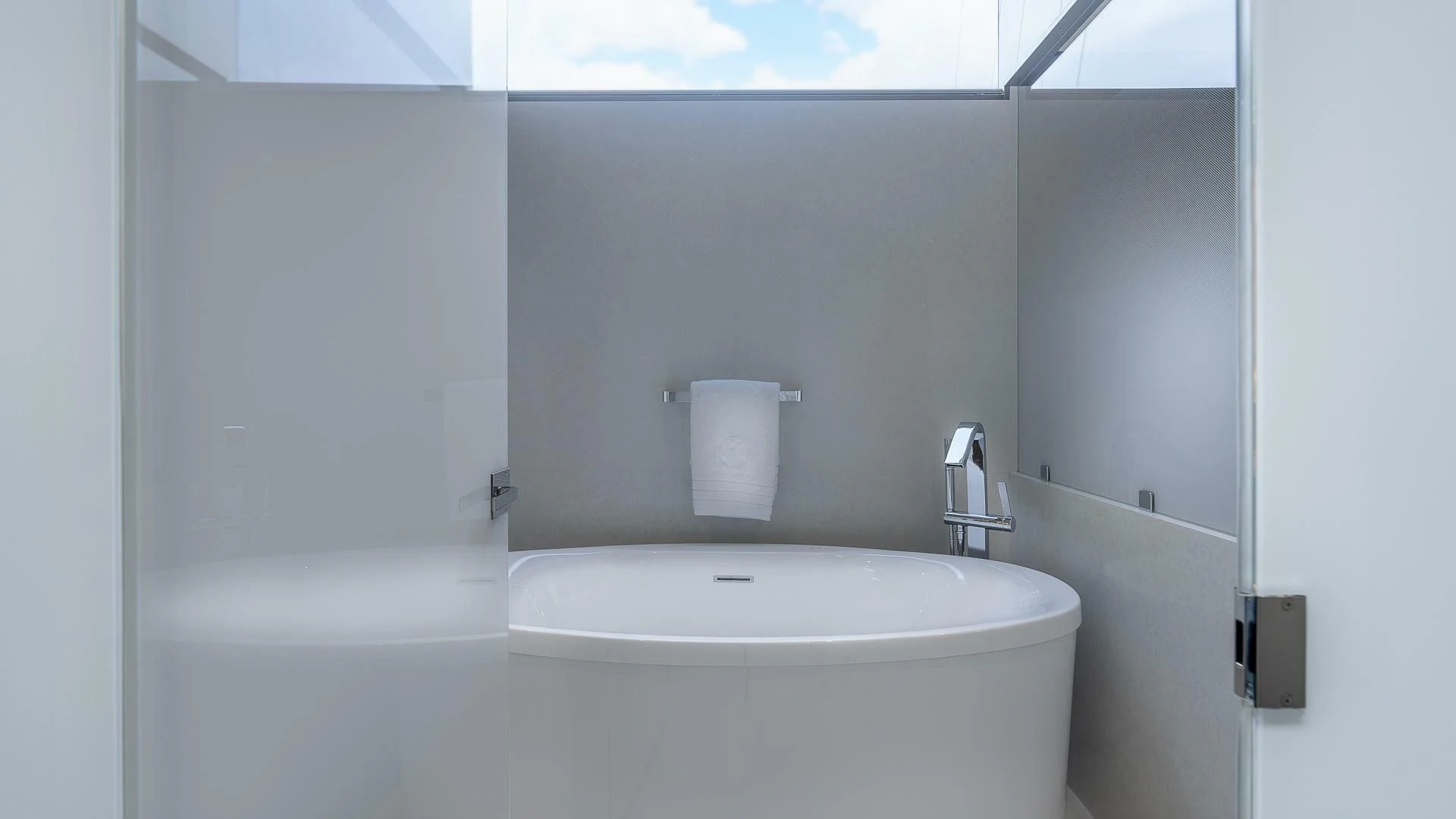 a white sink in a bathroom aboard ENTREPRENEUR Yacht for Charter