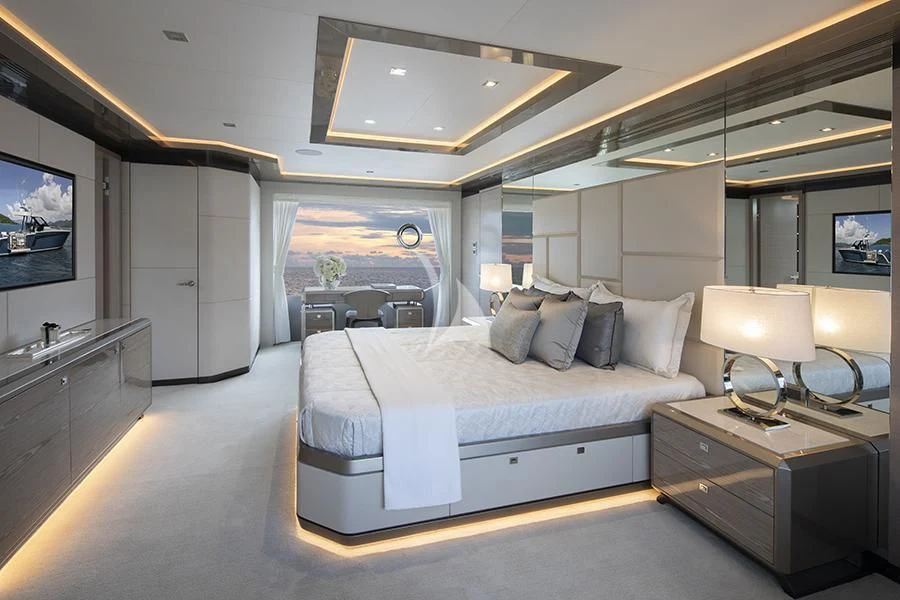 a large bedroom with a large bed aboard ENTREPRENEUR Yacht for Charter