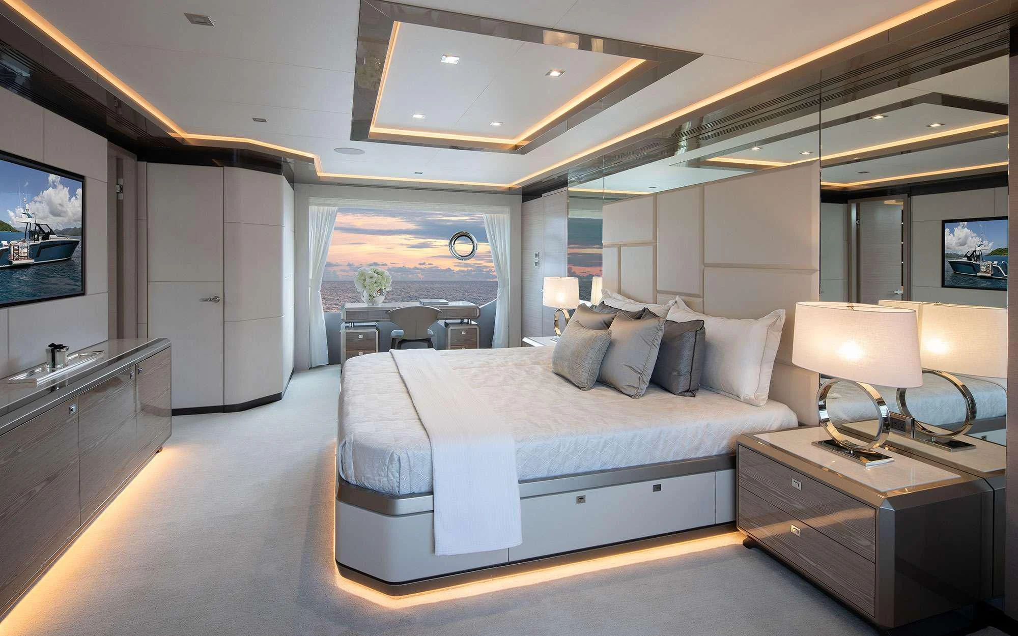 a large bedroom with a large bed aboard ENTREPRENEUR Yacht for Charter