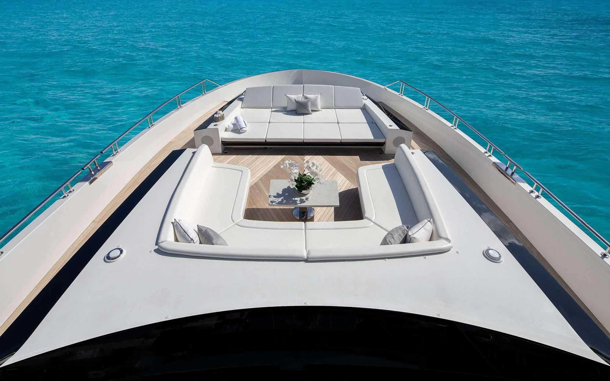a white boat on the water aboard ENTREPRENEUR Yacht for Charter