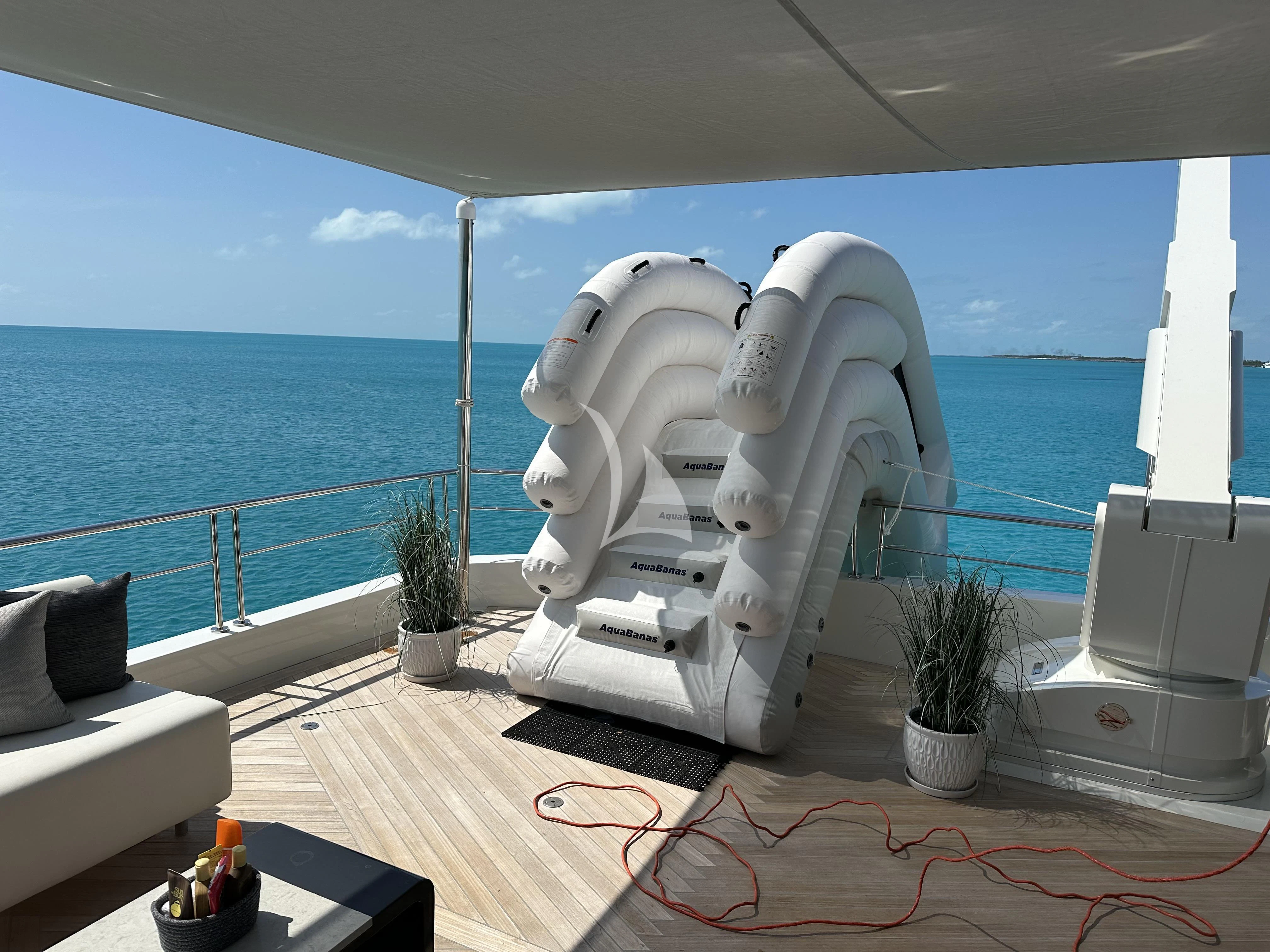 a white sculpture on a balcony aboard ENTREPRENEUR Yacht for Charter