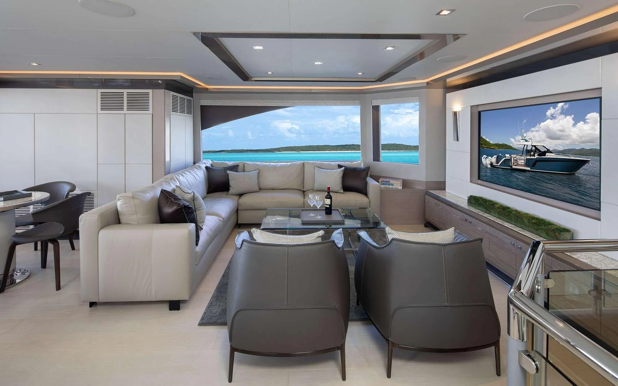 a living room with a large screen aboard ENTREPRENEUR Yacht for Charter