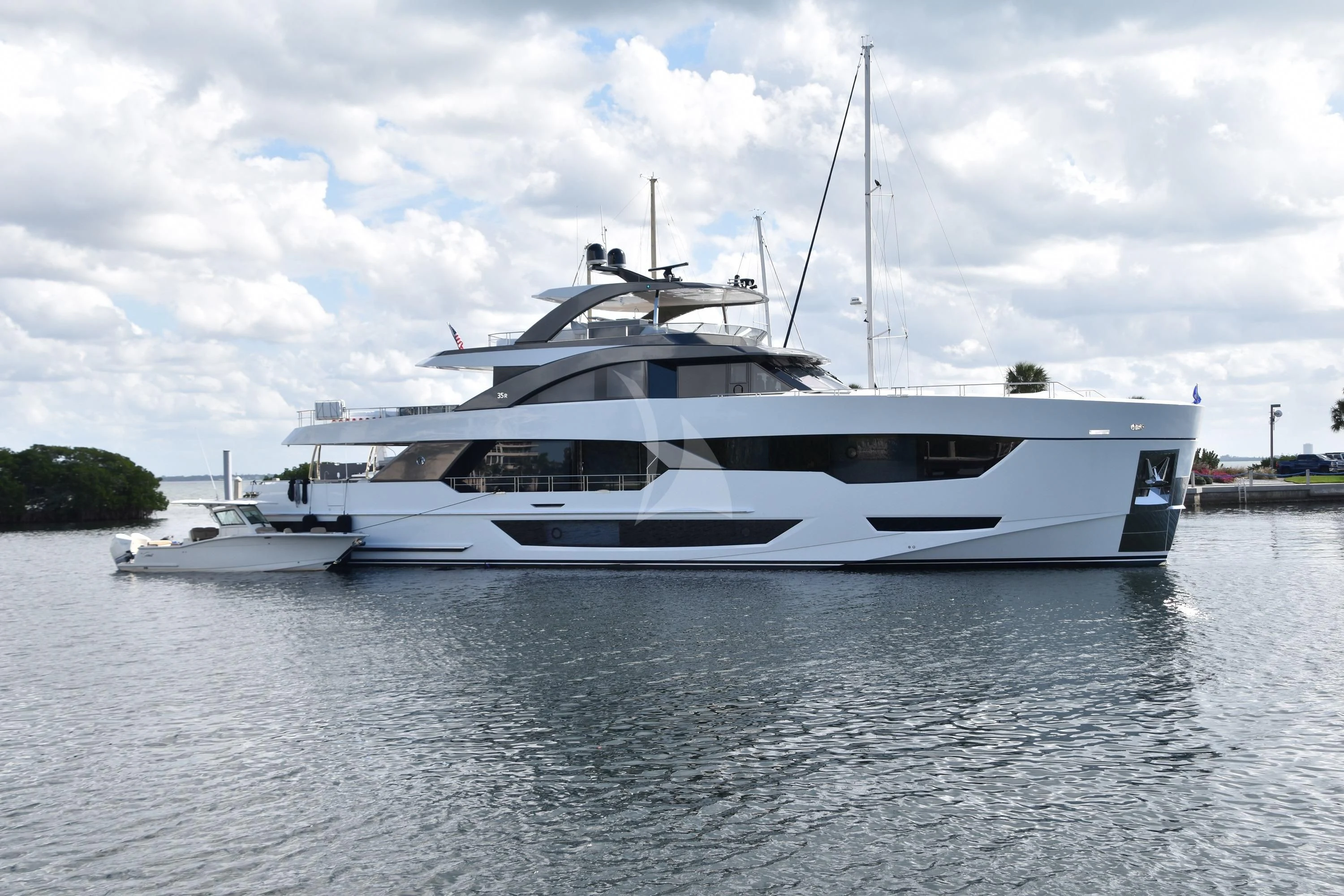 a white yacht on the water aboard ENTREPRENEUR Yacht for Charter