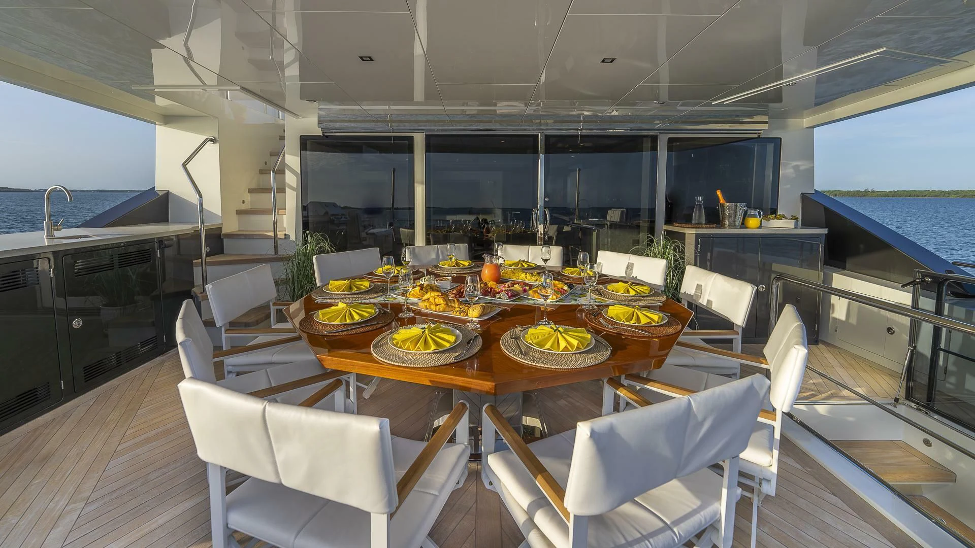 a large kitchen with a table and chairs aboard ENTREPRENEUR Yacht for Charter