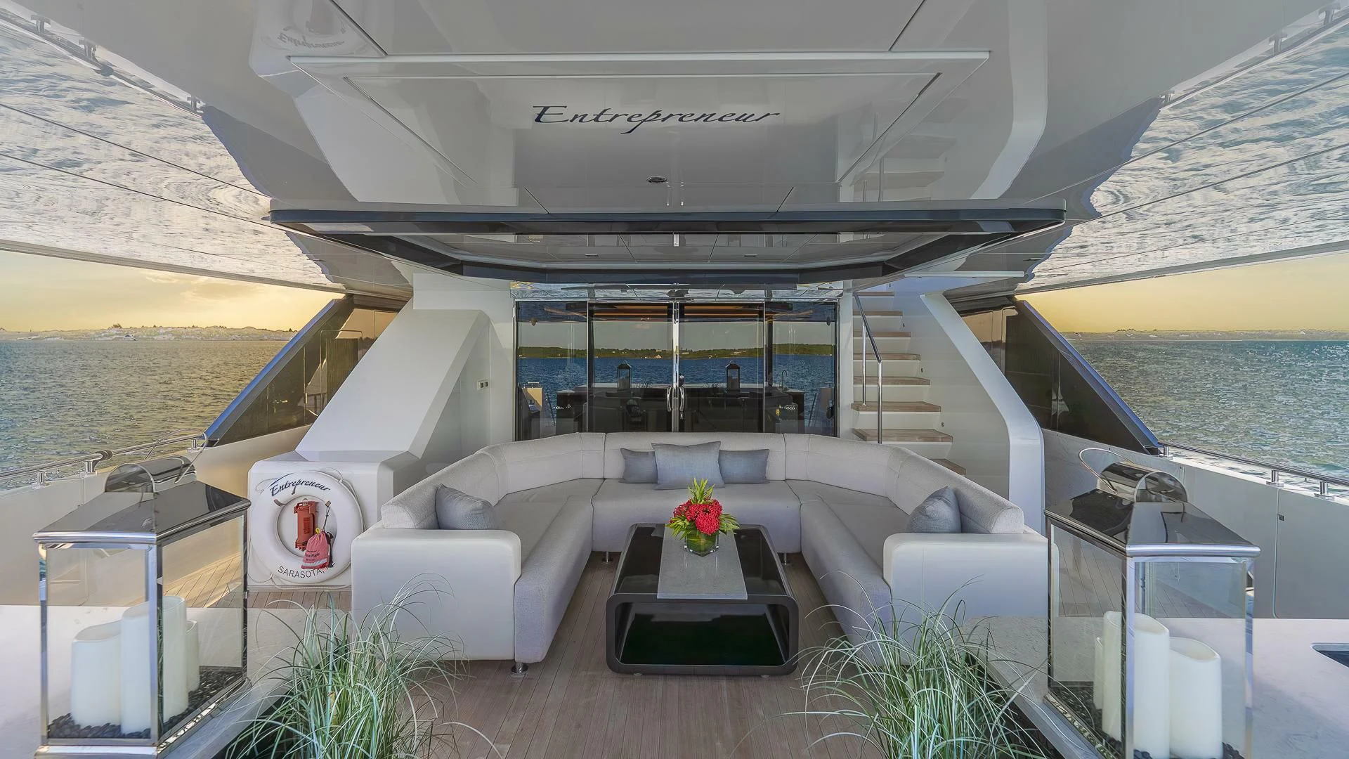 a room with a couch and a table aboard ENTREPRENEUR Yacht for Charter