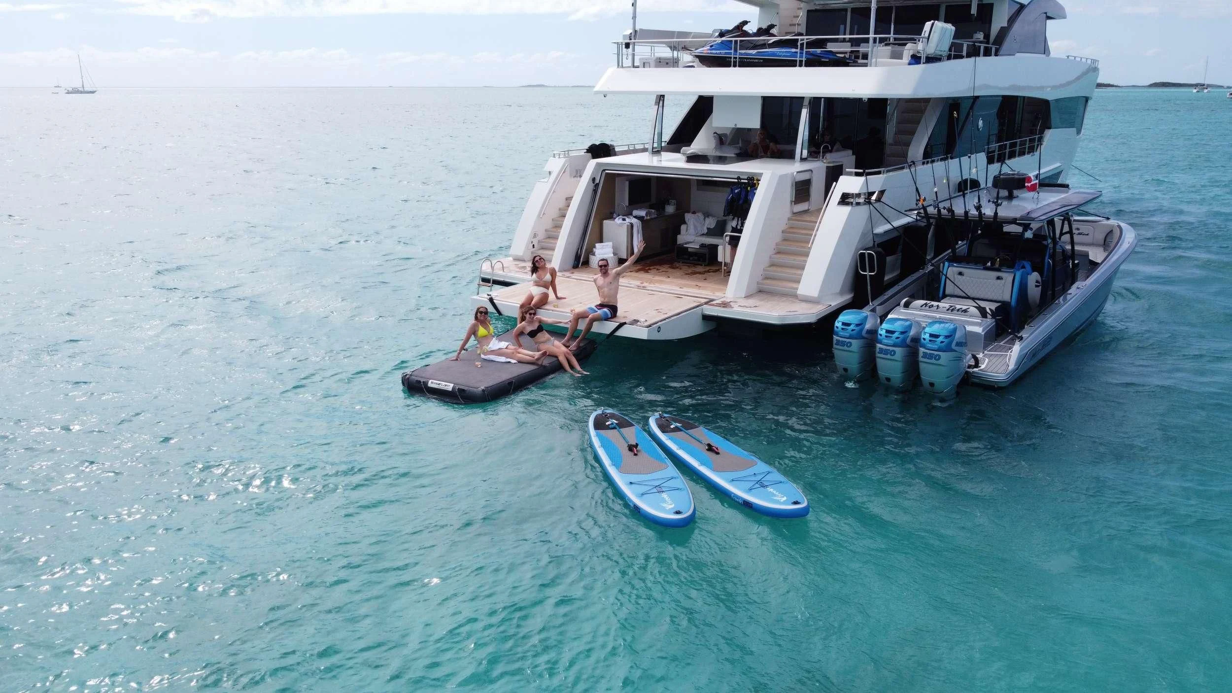 a boat with people on it aboard ENTREPRENEUR Yacht for Charter